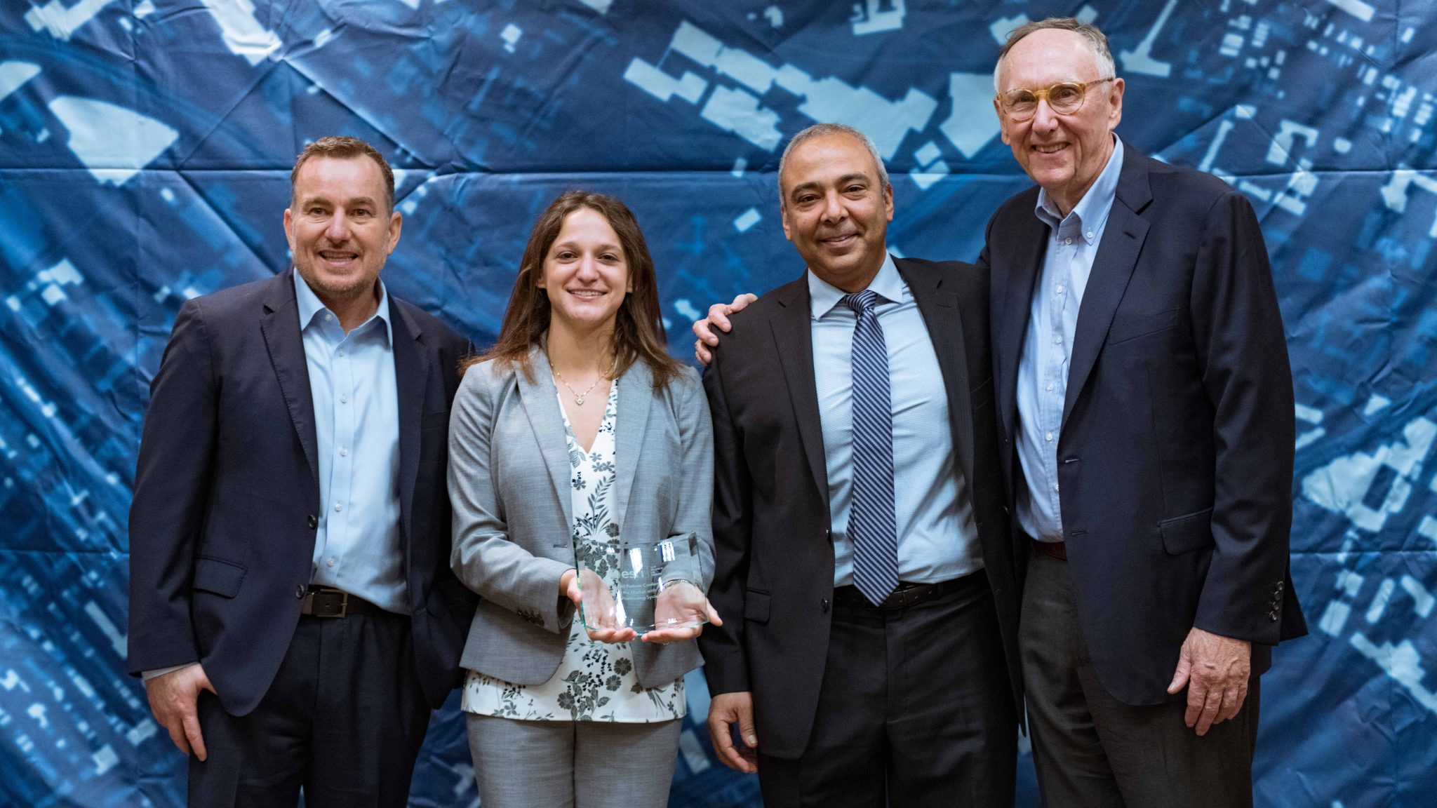 Left to Right: Esri Director of Global Business Development Jeff Peters, Eos Director of Marketing Sarah Alban, Eos CTO Jean-Yves Lauture, Esri President Jack Dangermond