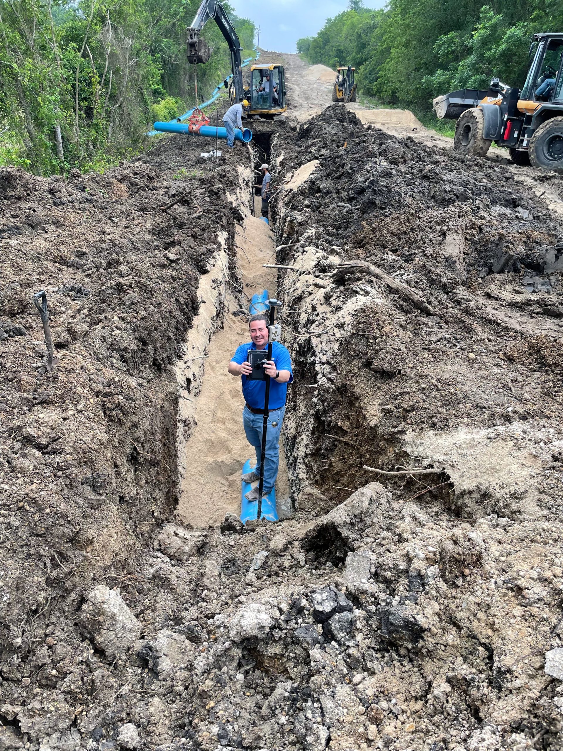 Dave Babicki performs data collection on a water main installation using Eos Arrow GNSS with Esri ArcGIS Field Maps for GPS / GIS asset collection