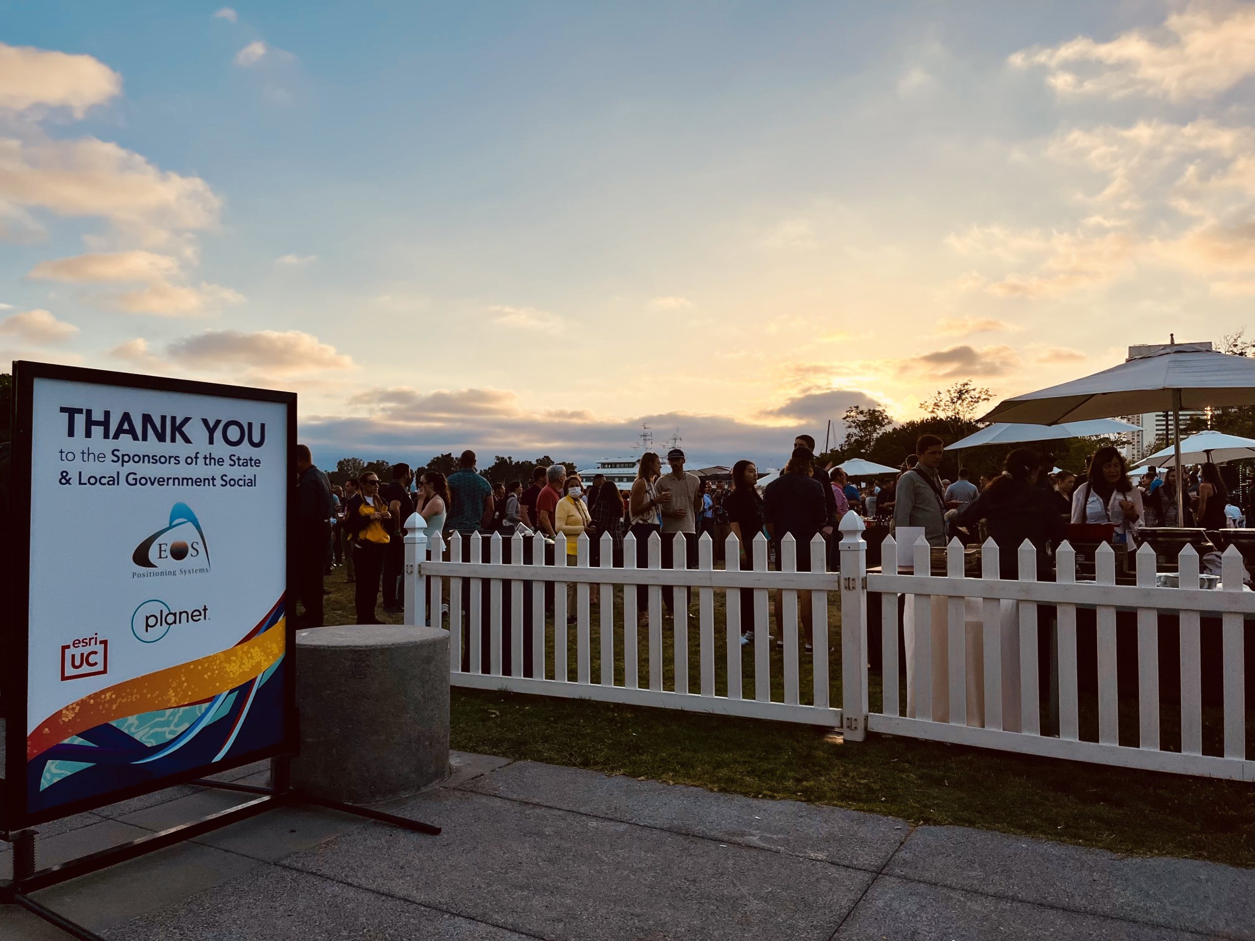 An Eos sponsor signs sits at the Esri State and Local Government social at the 2022 Esri UC