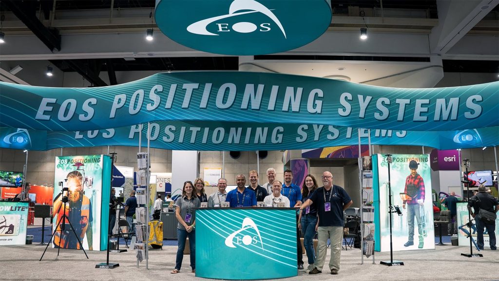 Eos Esri UC 2022 team stands at the Eos booth