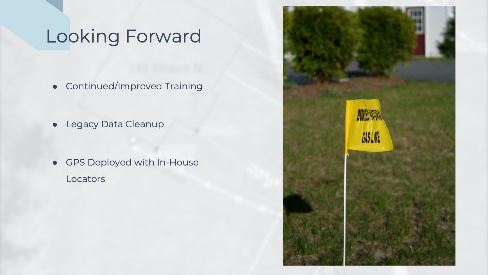 In the section "Looking Forward," James shows a slide reviewing their plans for continued and improved training, legacy data cleanup, and GPS deployed with in-house locators. An image of a yellow flag saying "Buried Natural Gas Line" is displayed to the righthand side of the slide.