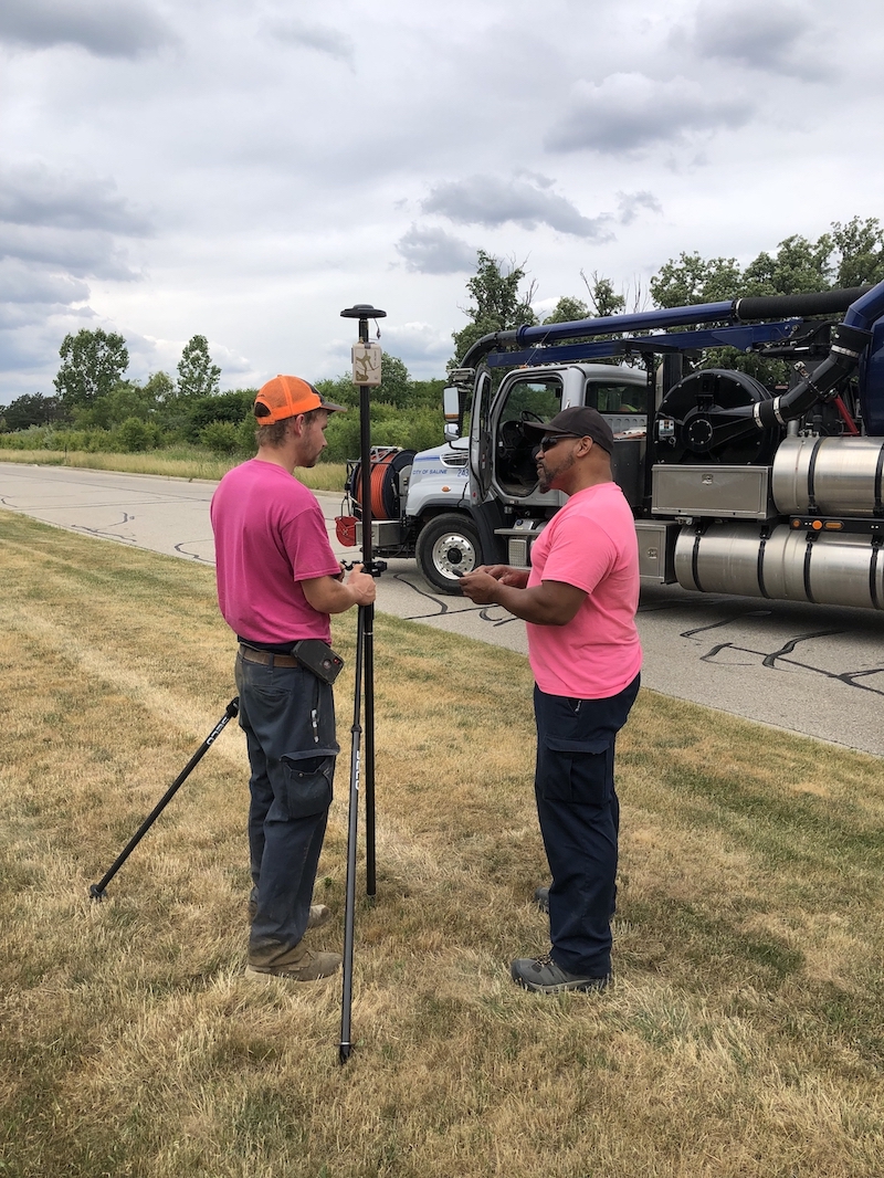 Saline Maintenance Technicians Zach Cole and Nick O’hair calibrate their field tools before collecting data.
