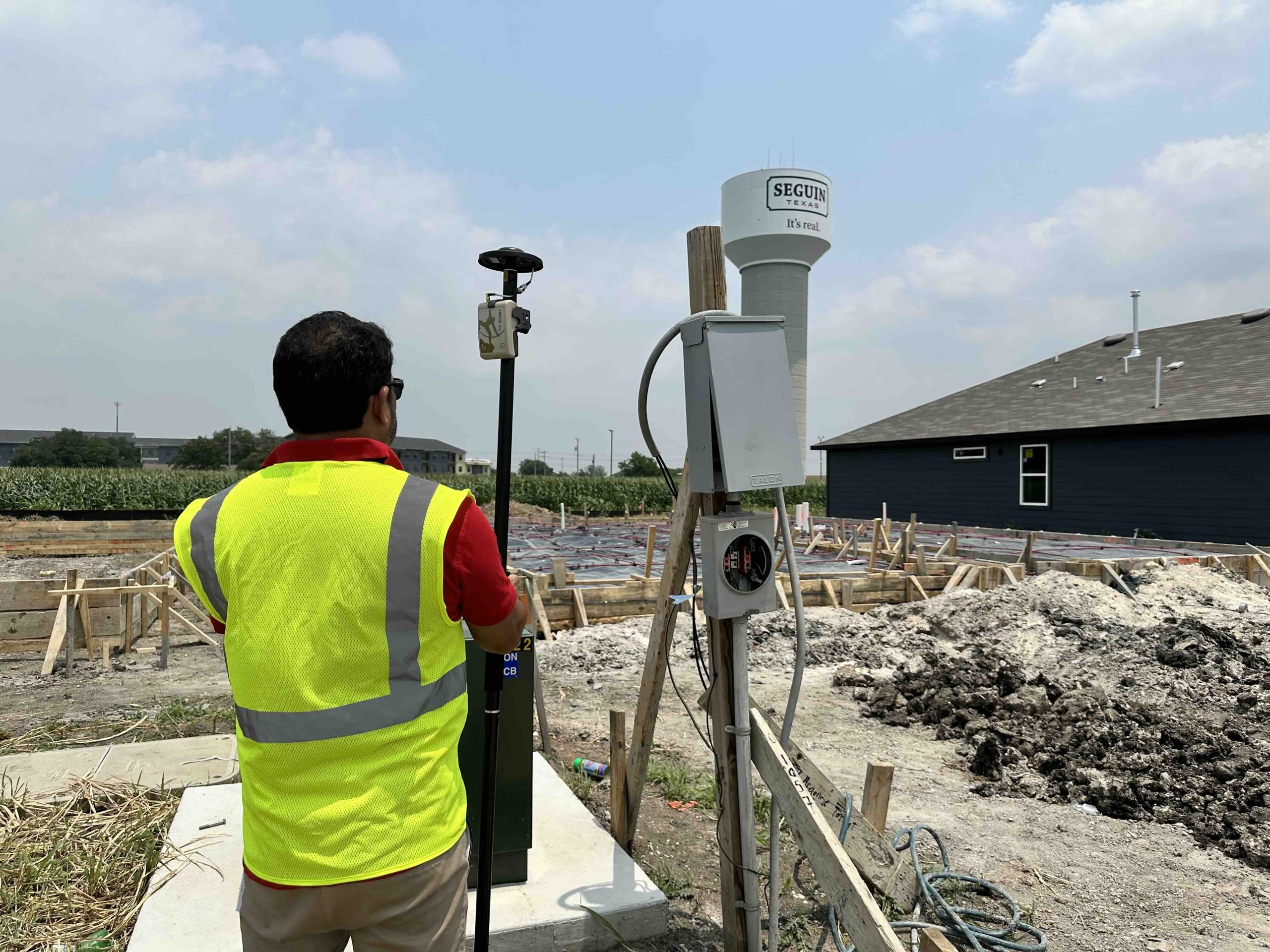 City of Seguin Smart Grid Solutions Manager John Saldana mapping a temporary electric meter, Hannah Heights neighborhood, Seguin, Texas. Arrow Gold, ArcGIS