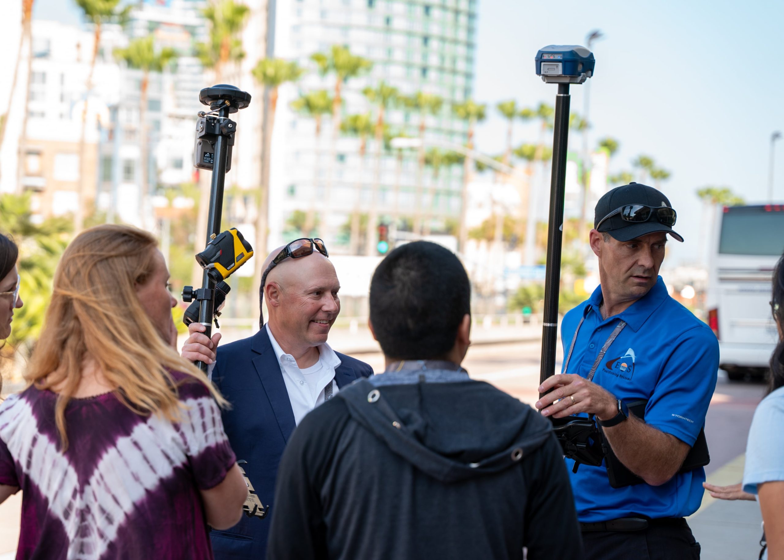 Mike George, Dan Zylstra, GNSS demonstration, Arrow Gold GNSS receiver with RTK antenna on range pole, Laser Tech, Laser Technology Inc LTI laser rangefinder, TruPulse, Eos Positioning Systems, live demo, 2024 Esri User Conference UC, San Diego Convention Center