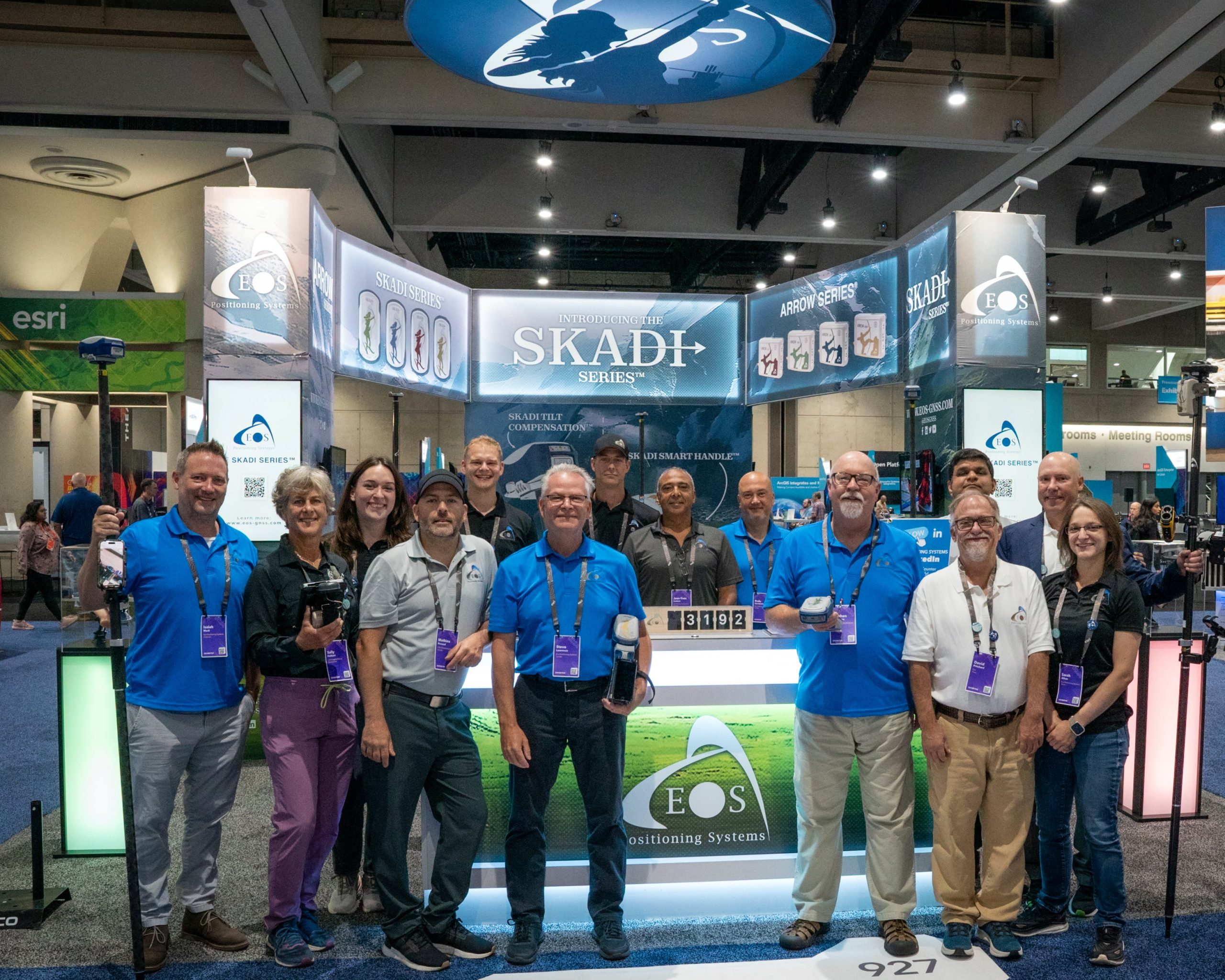 Isaiah Mack, Sally Holbert, Emma Hardy, Mathieu Roussell, Jake Holbert, Steve Lawrence, Dan Zylstra, Jean-Yves Lauture, Radu Constantinescu, Stephen Nicholson, David Pritchard, Satyam Dave, Mike George, Sarah Alban, Eos Positioning Systems, Skadi Series booth, 2024 Esri User Conference UC