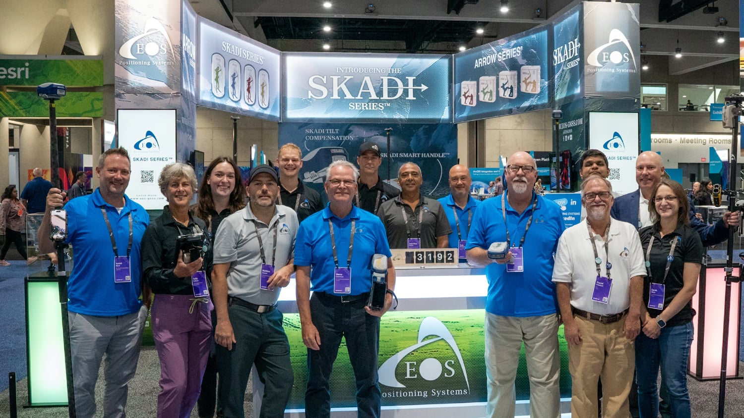 Isaiah Mack, Sally Holbert, Emma Hardy, Mathieu Roussell, Jake Holbert, Steve Lawrence, Dan Zylstra, Jean-Yves Lauture, Radu Constantinescu, Stephen Nicholson, David Pritchard, Satyam Dave, Mike George, Sarah Alban, Eos Positioning Systems, Skadi Series booth, 2024 Esri User Conference UC