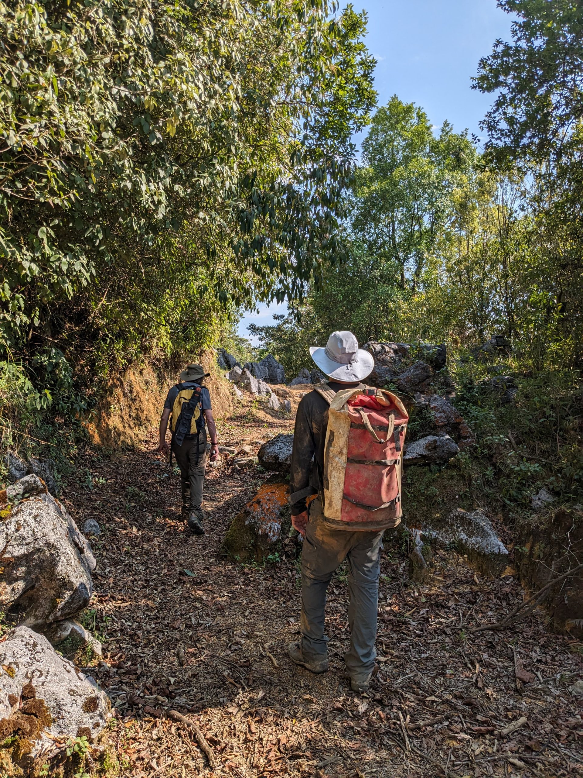 Cave explorers with PESH hike to their next entrance in the Sistema Huautla in Mexico.