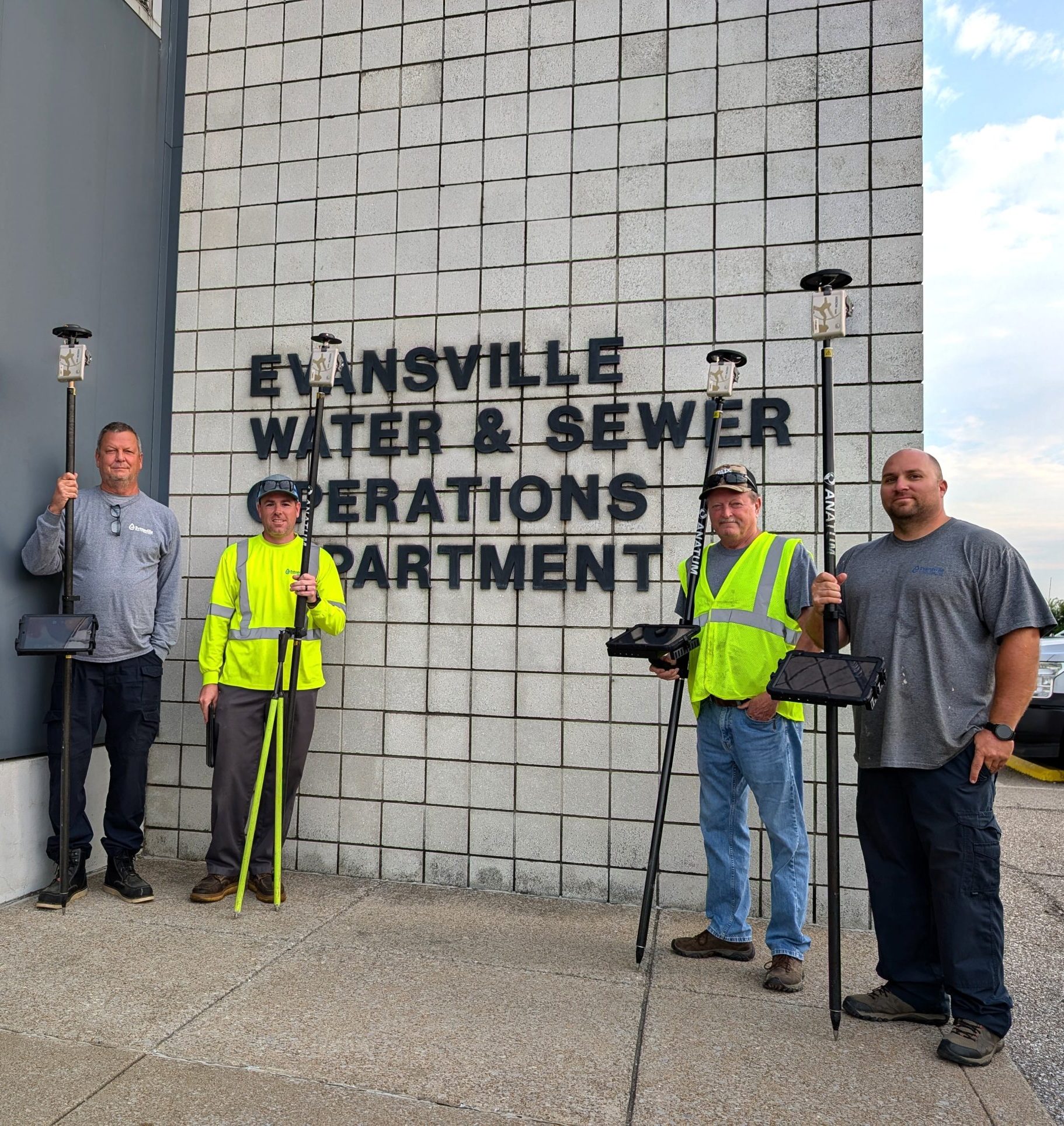 Evansville Water and Sewer Utility operations team poses with Arrow Gold GNSS receivers, which they use for high-accuracy data collection